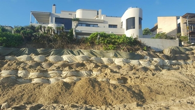 Homes in The Dunes sandbagged