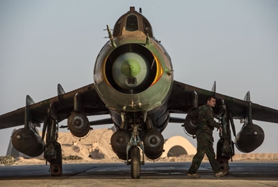 Russia's Putin visits Syria airbase and orders start of pullout