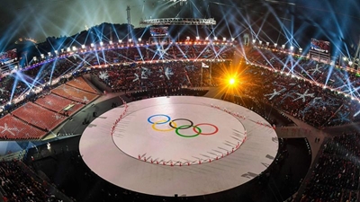 Two Koreas march apart as Games end