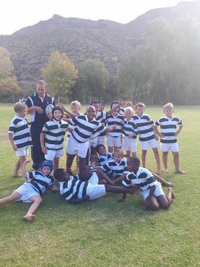 Team triumphs in 1st game