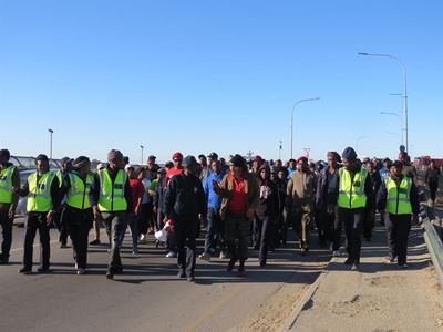 Security workers march again