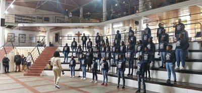 Traveling choir practises at museum