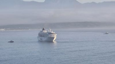 Cruise ship arrives in beautiful, misty morning in Mossel Bay