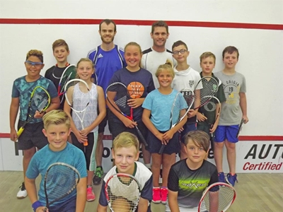 Coached in squash