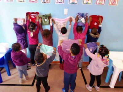 No virus can make these knitters drop a stitch