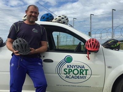 Cyclists still have their heads in the game with helmet giveaways