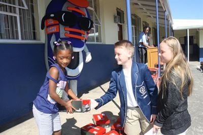 Donated school shoes for needy peers