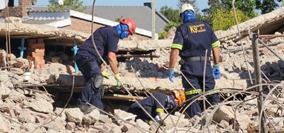Young electrical apprentice safely retrieved from rubble