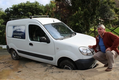 Car sinks along Milkwood Drive