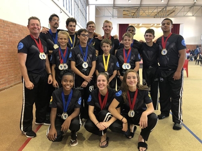 Grebe’s-skopboksklub palm medaljes in