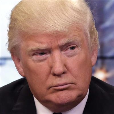 Trump denies any conflict of interest over business empire