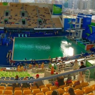 Olympic swimming pool turns green 