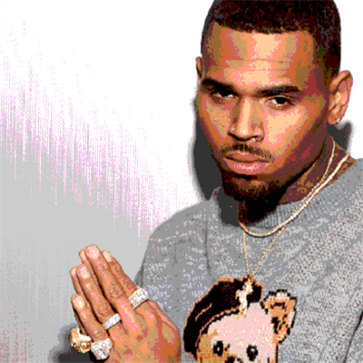 Chris Brown arrested for 'pointing gun at woman' 