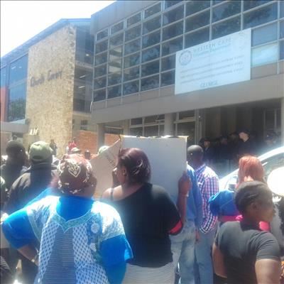 Marchers at education department