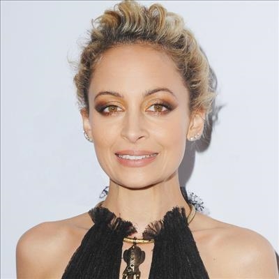 Nicole Richie almost set Lionel Richie on fire