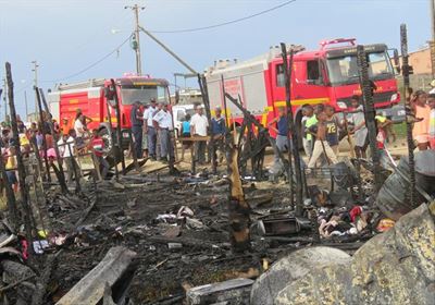 Shack fire leaves 4 families homeless