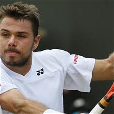 Wawrinka advances, Berdych stunned 