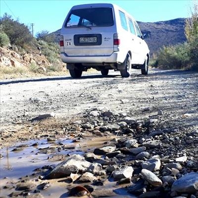 Residents petition against state of road