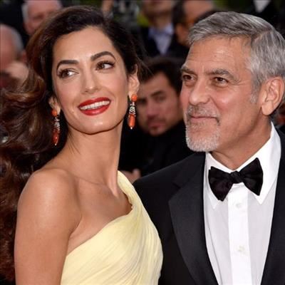 George & Amal Clooney incredibly happy
