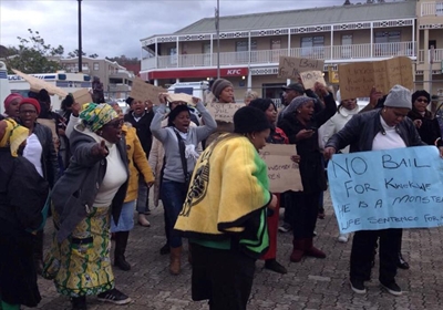 ‘Woman beaten to death in front of children’