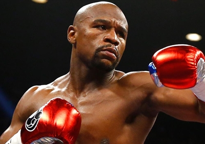 Undefeated Mayweather defeats McGregor