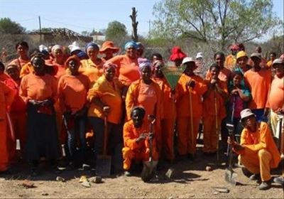 Workers do their part to clean up cemetery