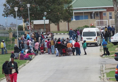 Hundreds queue hoping for distress grant