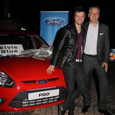 Elvis Blue gets away in a red Figo