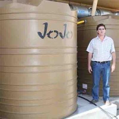 George business owner saves water with tanks