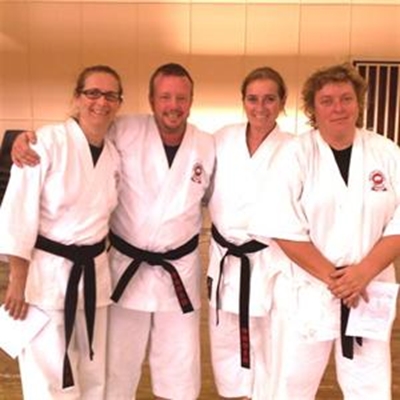 Two karatekas receive nidan