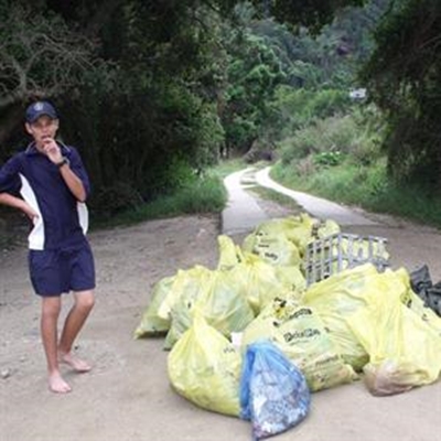 Learners clean littered coast