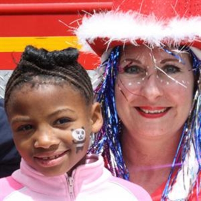 Mother Christmas and firemen visit Child Welfare