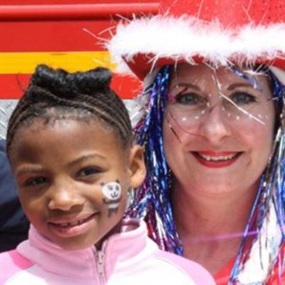 Mother Christmas and firemen visit Child Welfare