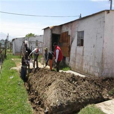 Mama Remona digs foundations 
