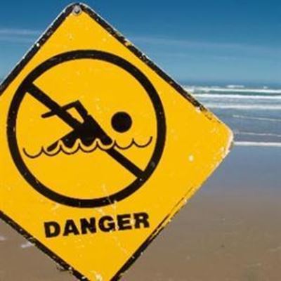 Men swept out to sea by rip-currents
