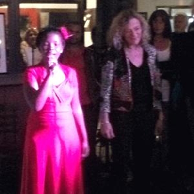 Young lady in red sings