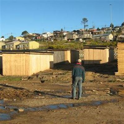 Evicted residents rebuild homes