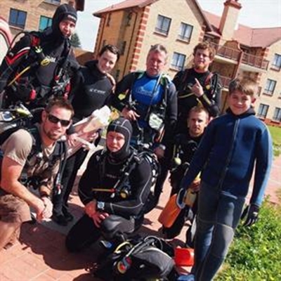 Divers clean-up shore and sea