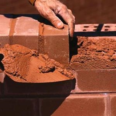 Inmates build houses for needy