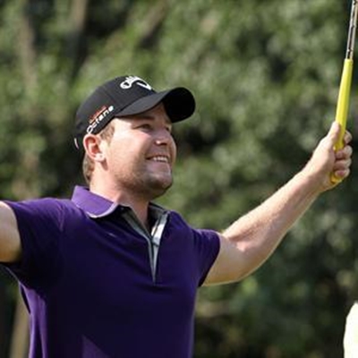 George se Branden Grace loop voor