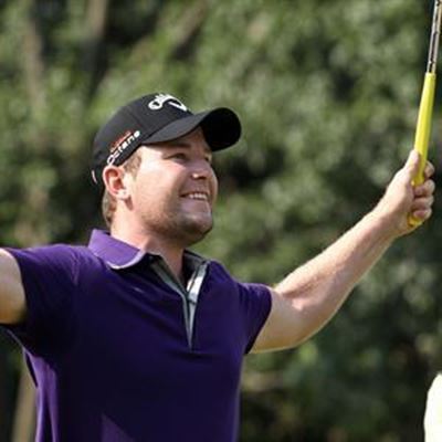 George se Branden Grace loop voor