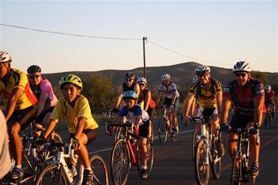 Fietsryers trap vir 'n doel