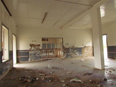 Gevandaliseerde stasiegebou te huur