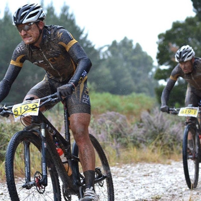 Woolcock and Luus claim muddy victory