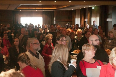 Professionals gather at business breakfast