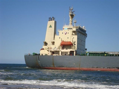 Oil being pumped from leaking ship