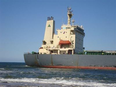 Oil being pumped from leaking ship