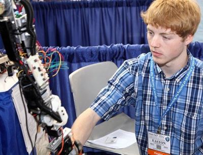 Teen robotics creator in George