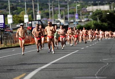 Men's speedo run for cancer awareness