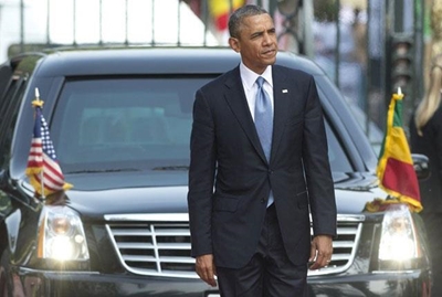 Memorial starts without Obama